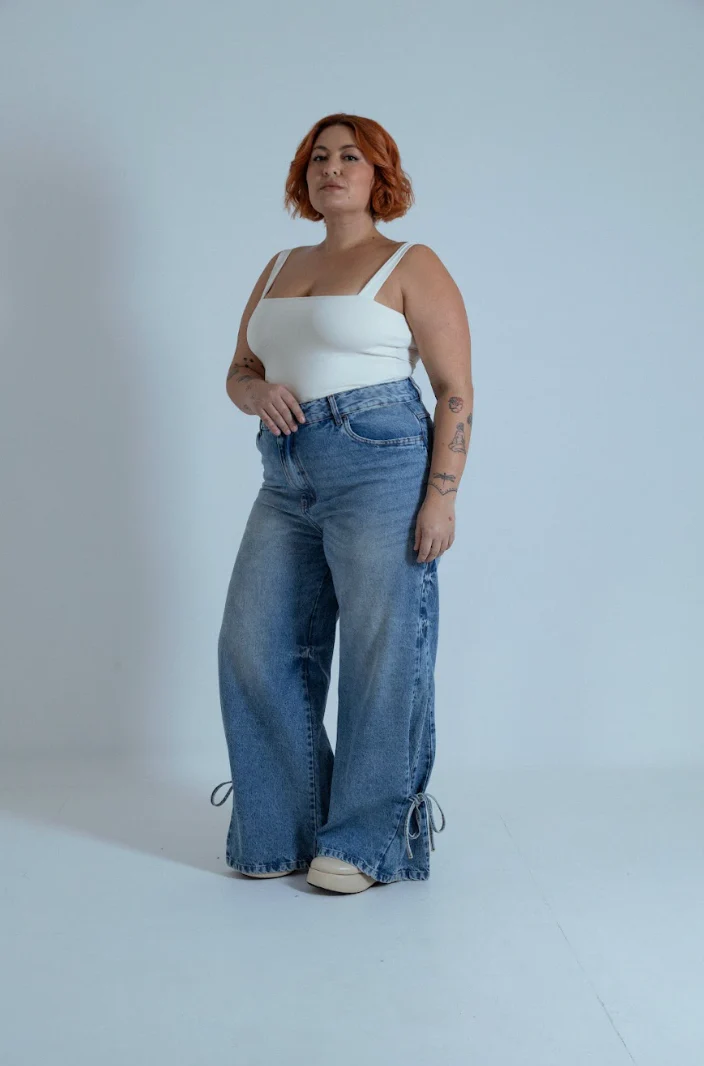 calça jeans ajustável laço acid wash